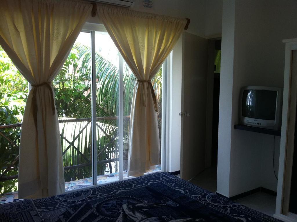 Hotel Residencia La Mariposa Тулум Номер фото